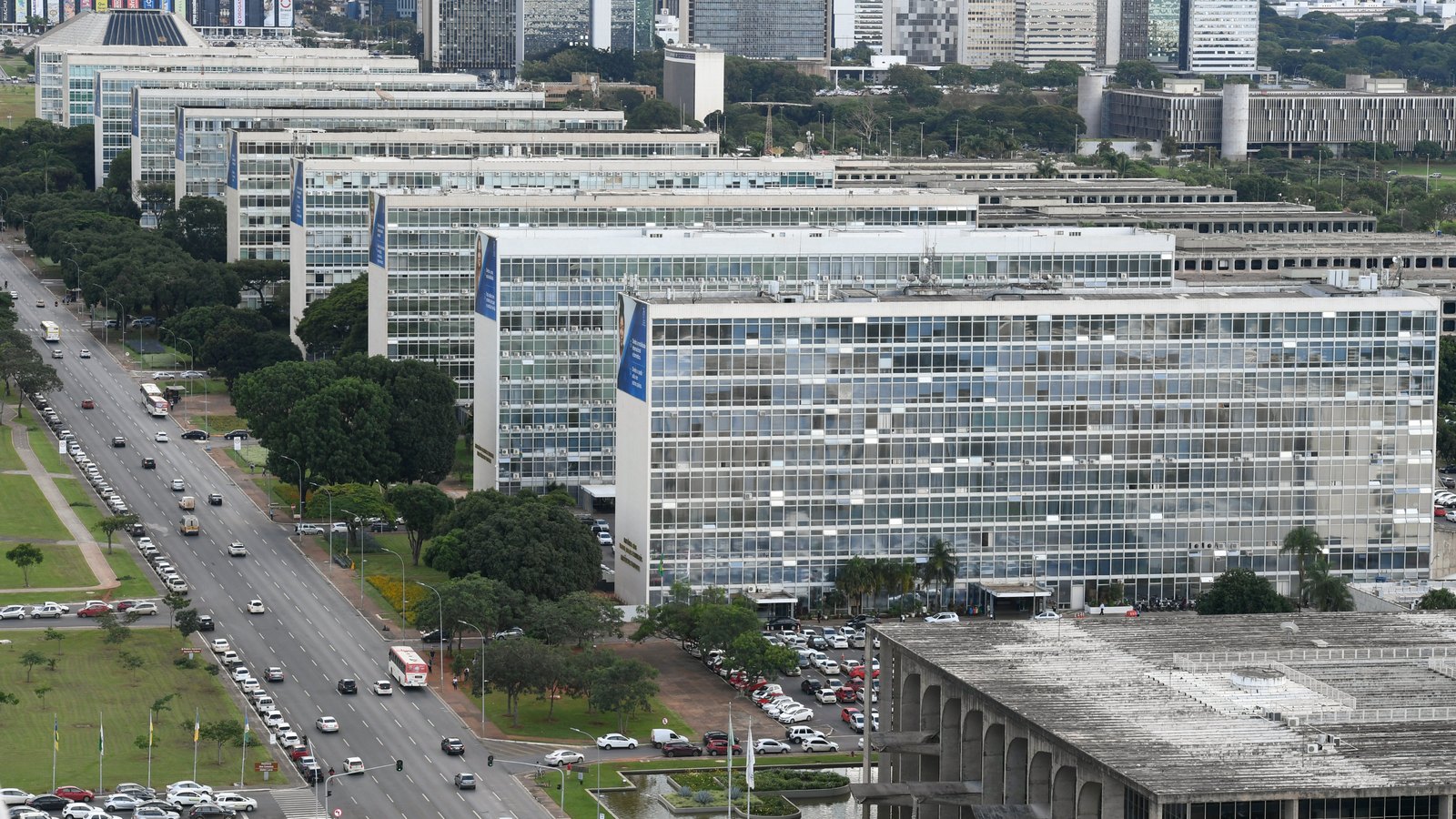 Aerial view of identical rows of ministry blocks lining a wide avenue